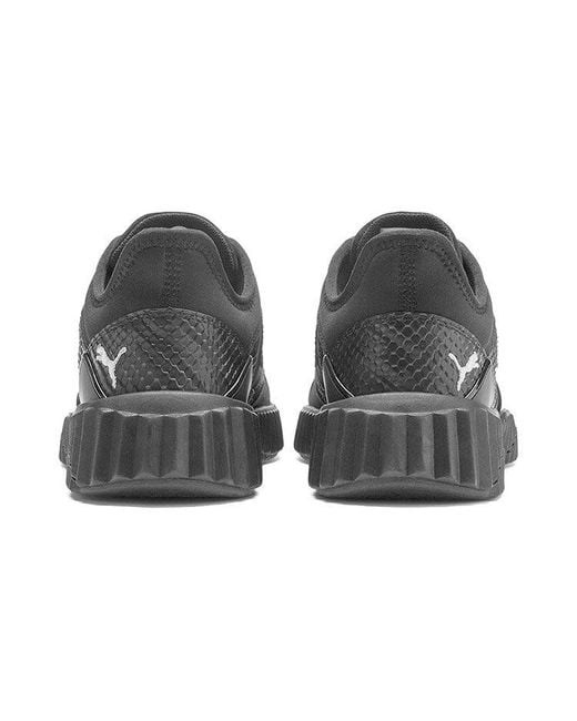 PUMA Black (Wmns) Defy Stitched Croc Low Top Running Shoes