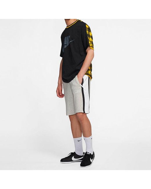 grey nike shorts with zip pockets