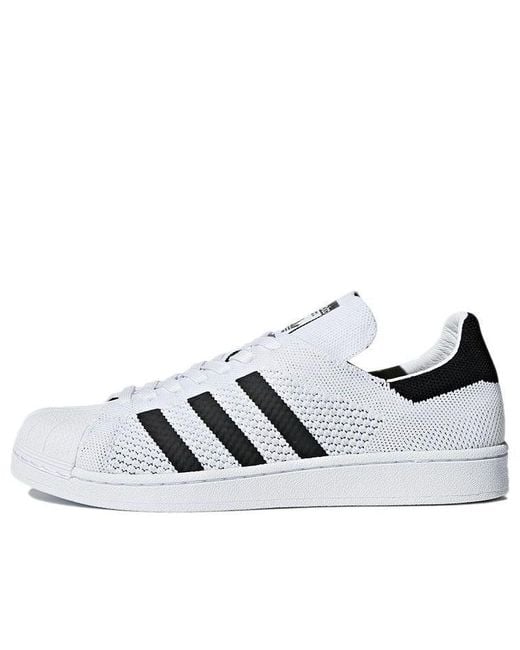 superstar primeknit mens white