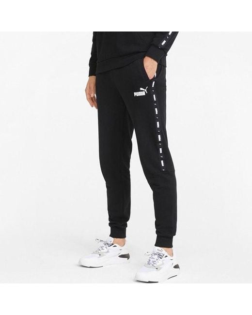 PUMA Black Ess+ Tape Sweatpants for men