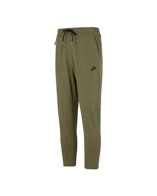 Nike Green Solid Color Logo Training Fleece Bundle Feet Sports Pants/Trousers/Joggers Military for men
