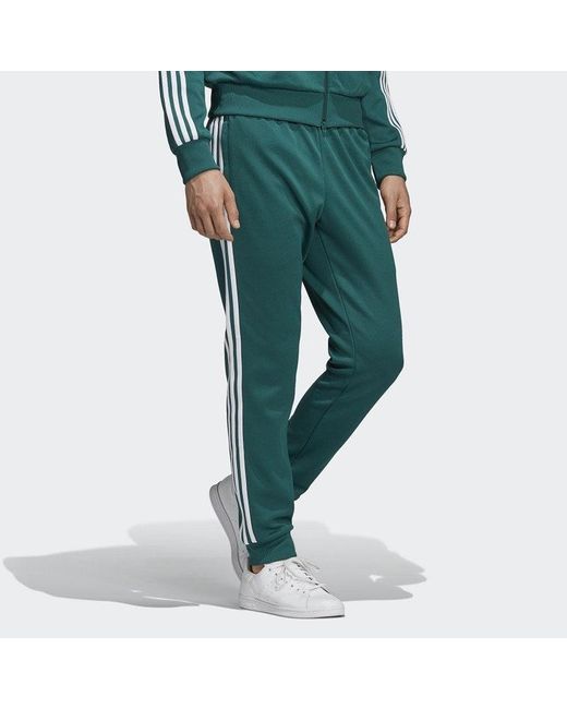 Adidas Green Originals Sst Tp Logo Embroidered Sports Pants for men