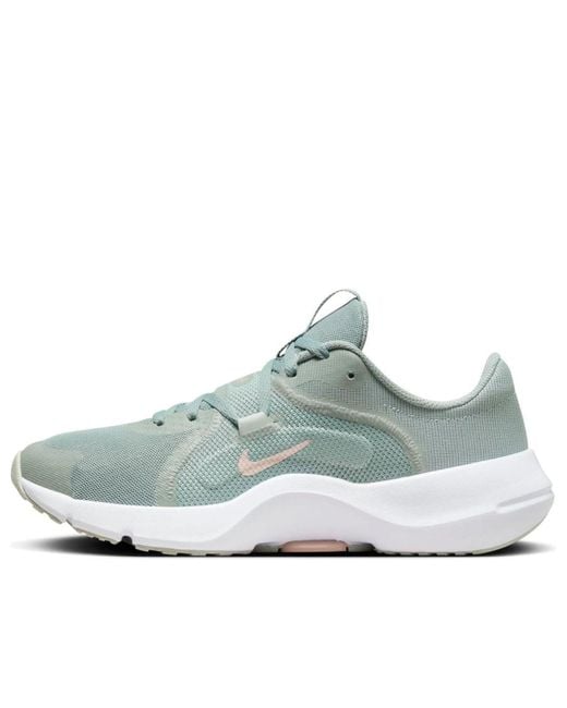 nike legend react mica green