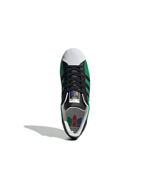 Adidas Green Superstar Core' for men