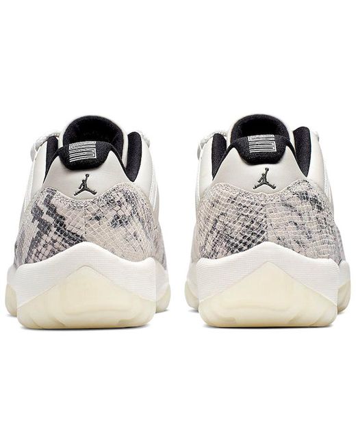 Nike White 11 Retro Low 'Light Bone Snakeskin' for men