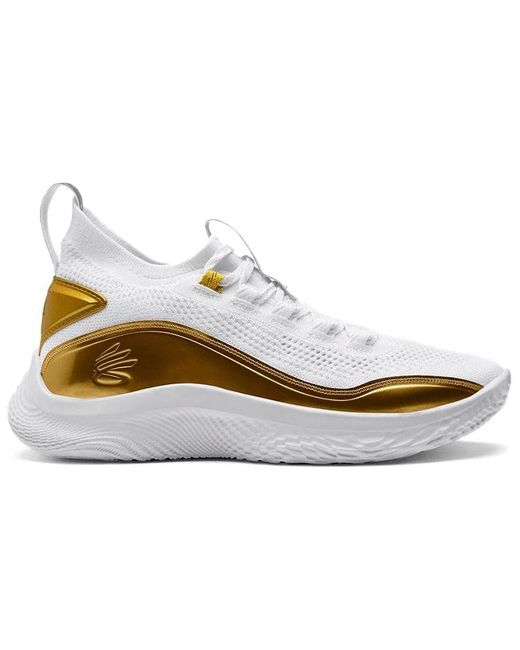 curry gold and white shoes