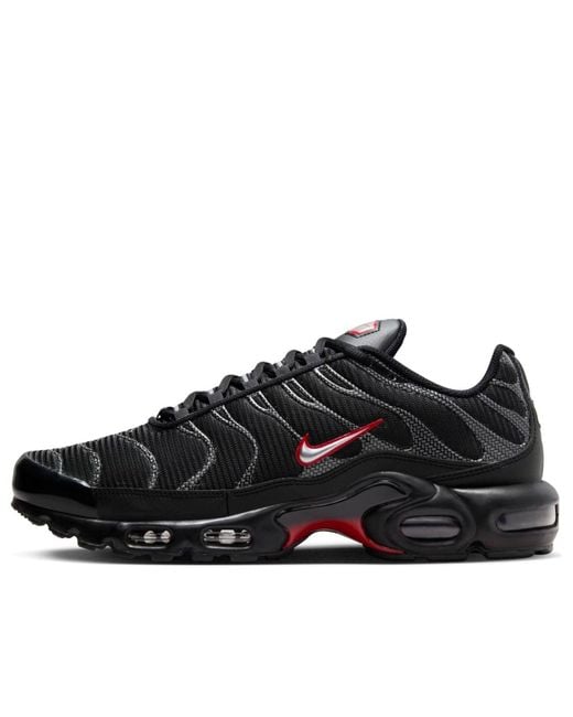 red nike tn trainers