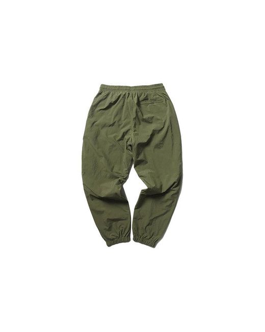 PUMA Green X Randomevent Woven Pants for men
