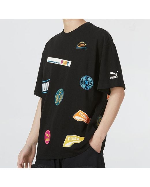 PUMA Black Mix Badge Logo Tee for men