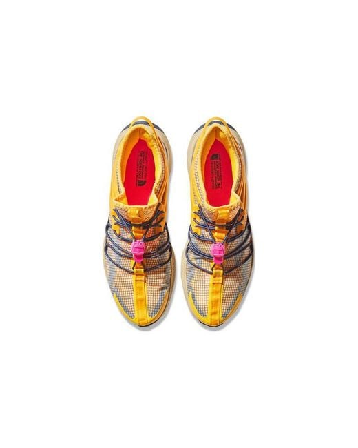 The North Face Yellow Oxeye Tech Running Shoes for men