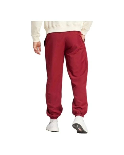 Adidas Red Manchester United Lfstlr Woven Pants for men