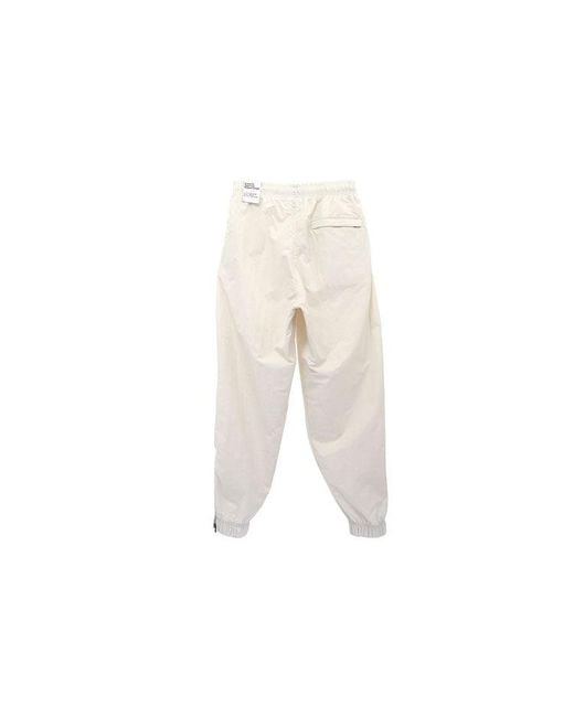 Nike White Solid Color Logo Printing Elastic Waistband Bundle Feet Sports Pants/Trousers/Joggers Autumn for men