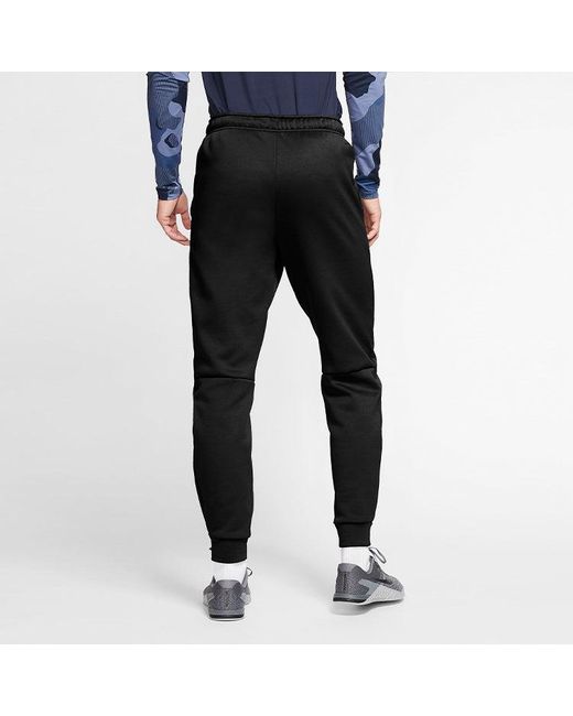 Nike Black Therma Tapered Swoosh Fleece Lined Sports Training Long Pants for men