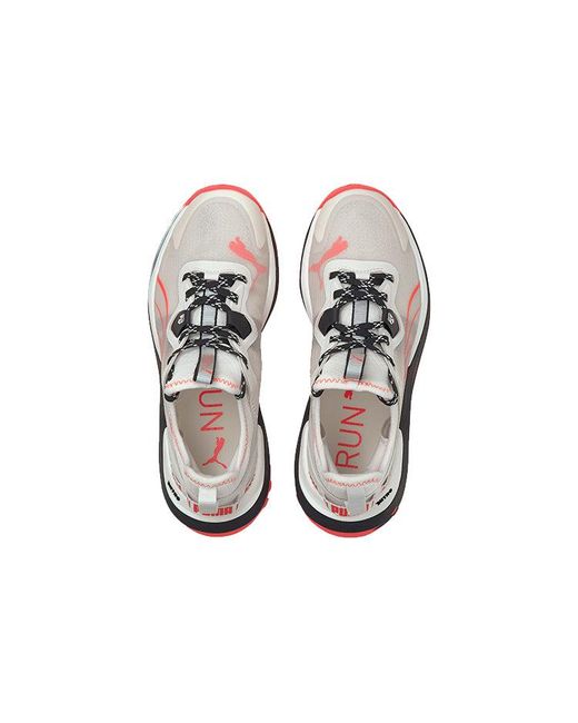 PUMA White Voyage Nitro Black/red/gray