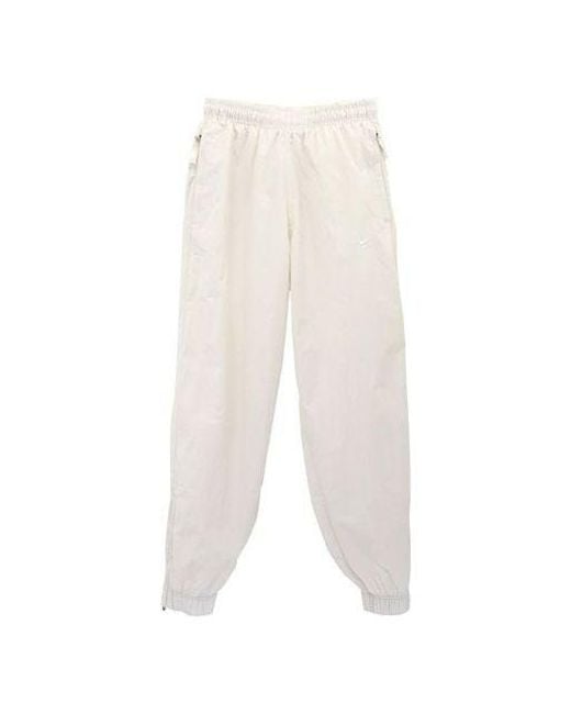 Nike White Solid Color Logo Printing Elastic Waistband Bundle Feet Sports Pants/Trousers/Joggers Autumn for men
