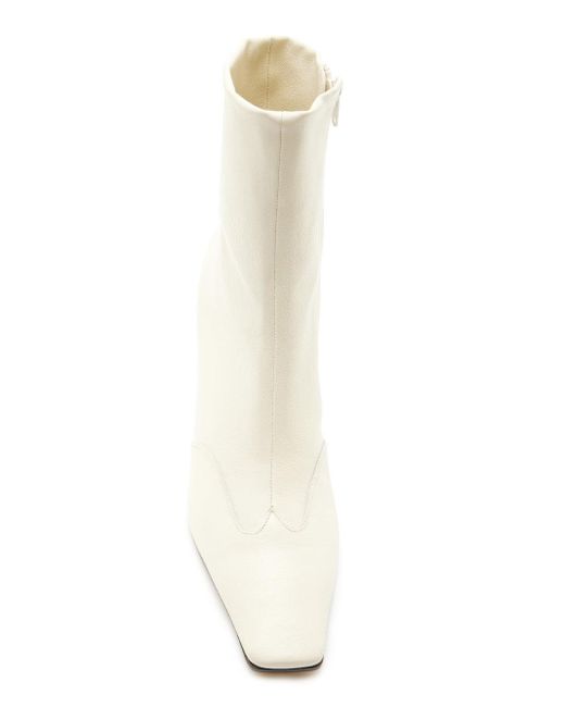 Khaite The Nevada Stretch Ankle Boot in White | Lyst