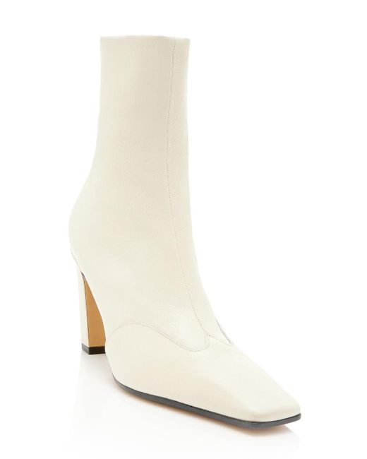 Khaite The Nevada Stretch Ankle Boot in White | Lyst