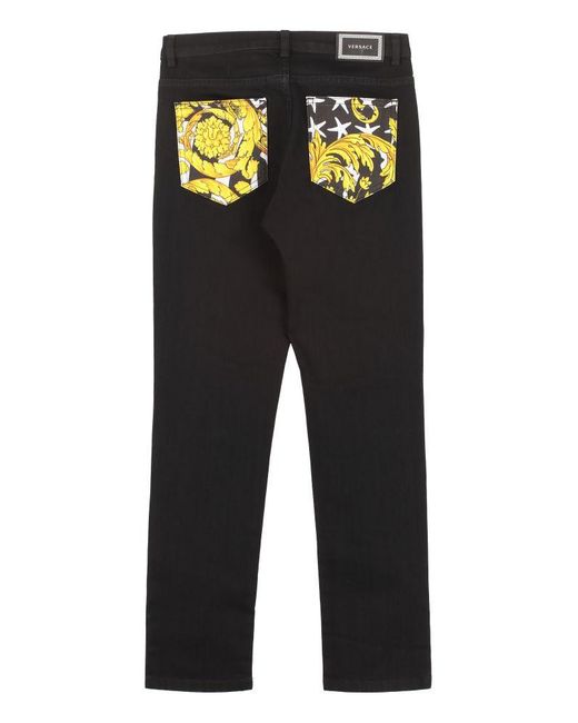 Versace Stretch Cotton Jeans in Black | Lyst