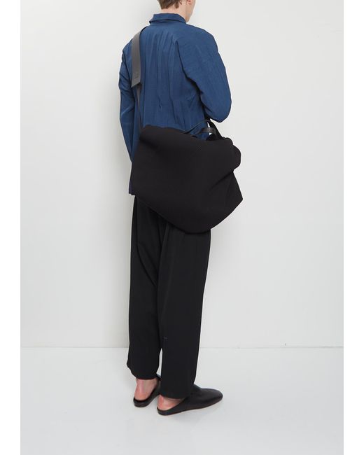 Homme Plissé Issey Miyake Travel Bag in Black | Lyst