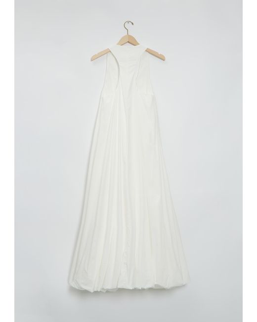 the row white gown