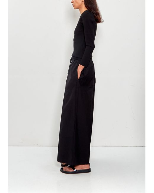 Totême Black Wide Summer Trousers