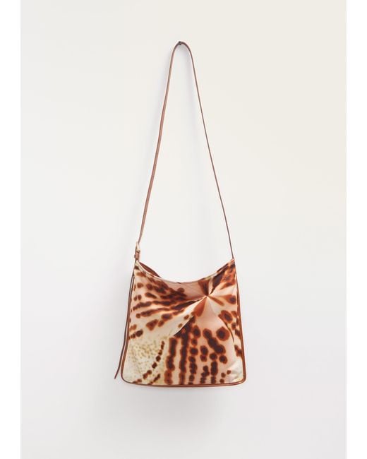トートバッグ Dries Van Noten Peach Bag With Gold-Tone Chain Strap Dries Van Noten Peach Bag With Gold-Tone Chain Strap | THE LIST