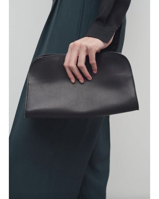 The Row Black Peggy Saddle Leather Clutch