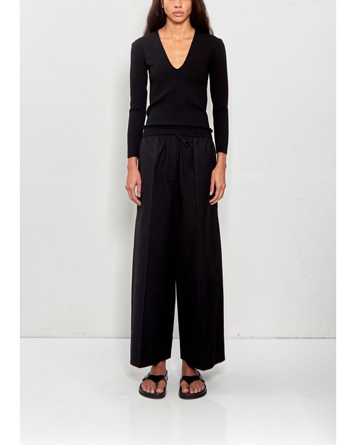 Totême Black Wide Summer Trousers
