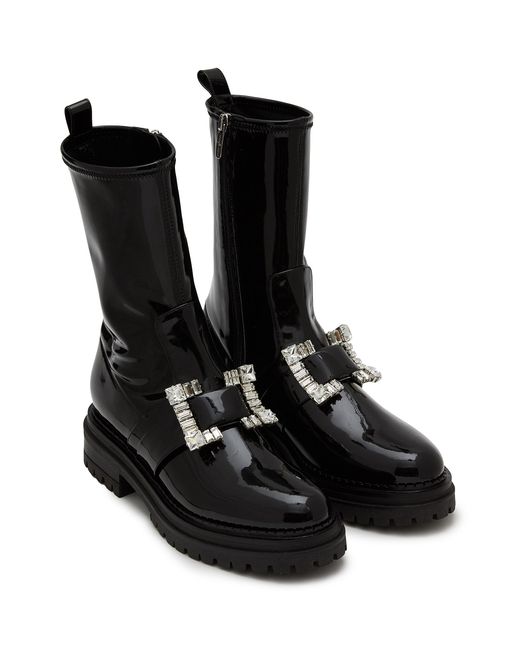 buckled boots in cracked patent leather - black