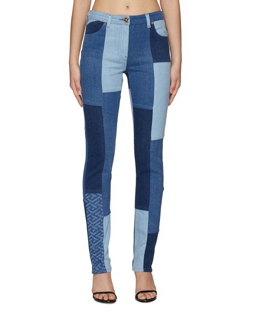 Versace Denim Monogram Patchwork Flared Jeans in Blue | Lyst