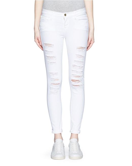 frame white ripped jeans