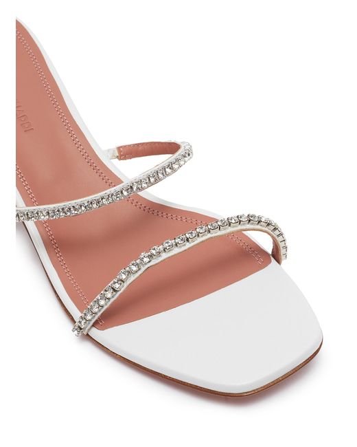 amina muaddi white pump