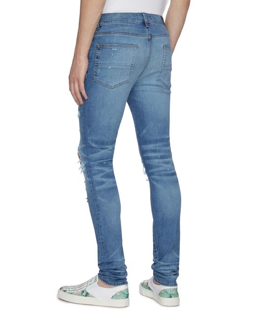 amiri hawaiian patch jeans