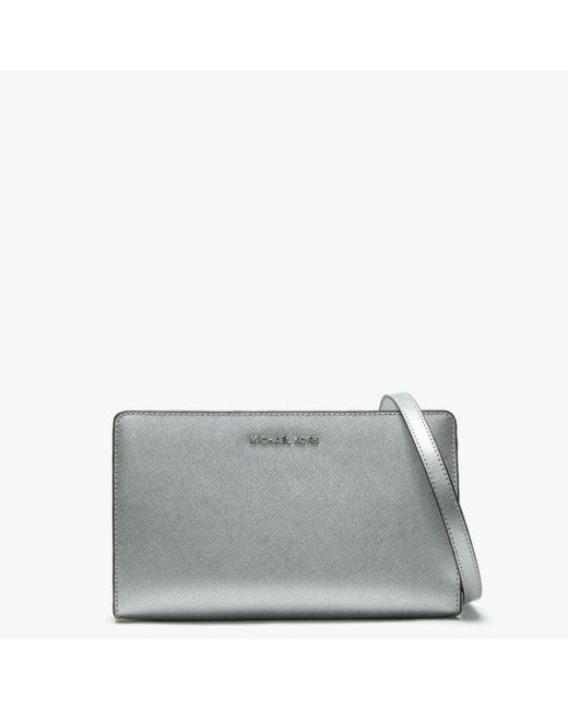 Lyst Michael Kors Large Saffiano Silver Leather Cross Body Clutch Michael Kors Metallic Large Saffiano Silver Leather Cross Body Clutch Bag Colo Lyst