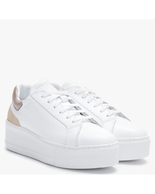 gold flatform trainers