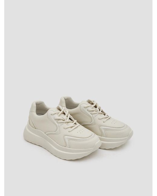 white chunky platform sneakers