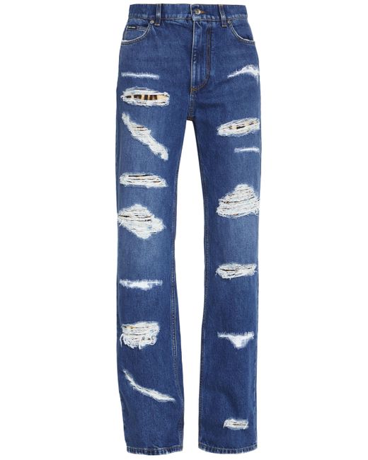 Jeans con strappi e stampa leo di Dolce & Gabbana in Blue