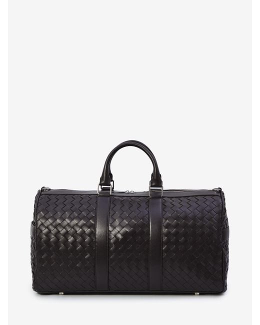 Borsa Da Viaggio Intrecciato di Bottega Veneta in Black da Uomo