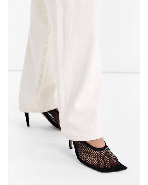 Christen White Edge Stretch Pumps