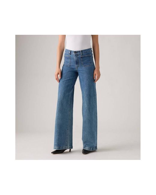 Jeans 728 A Vita Alta Con Gamba Ampia di Levi's in Blue