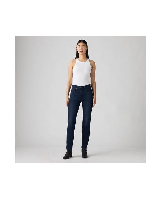 Jeans 724 Dritti A Vita Alta di Levi's in Blue