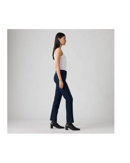 Jeans 724 Dritti A Vita Alta di Levi's in Blue