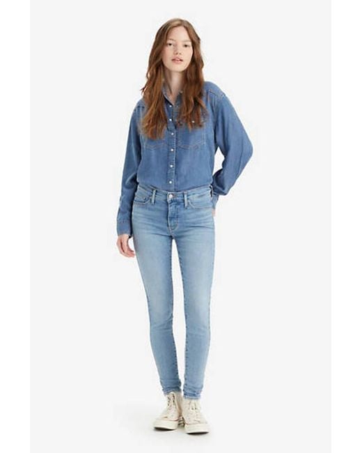 Levi s 310 Shaping Super Skinny Jeans in Black Lyst UK