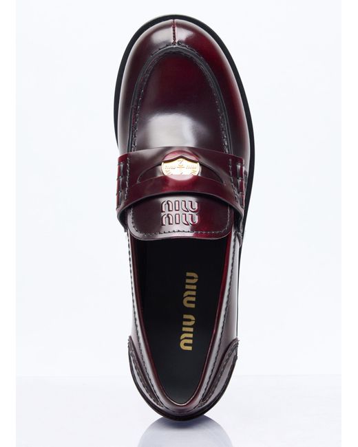 Miu Miu White Leather Penny Loafers