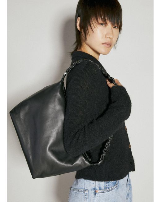 Kara Xl Lattice Pouch Shoulder Bag in Black Lyst UK