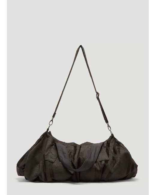 h:ours Black Mud Stripe Duffle Bag for men