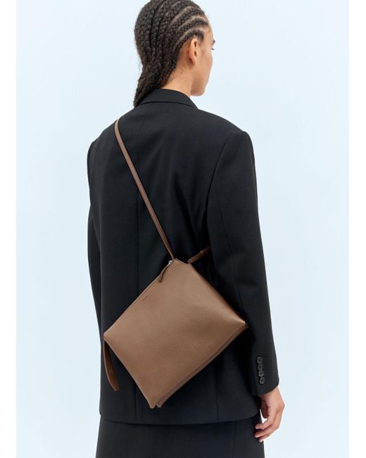 THE ROW 正規品/送料関税込み NU TWIN Pouch shoulder bag THE ROW Nu Twin mini leather shoulder bag | NET-A-PORTER