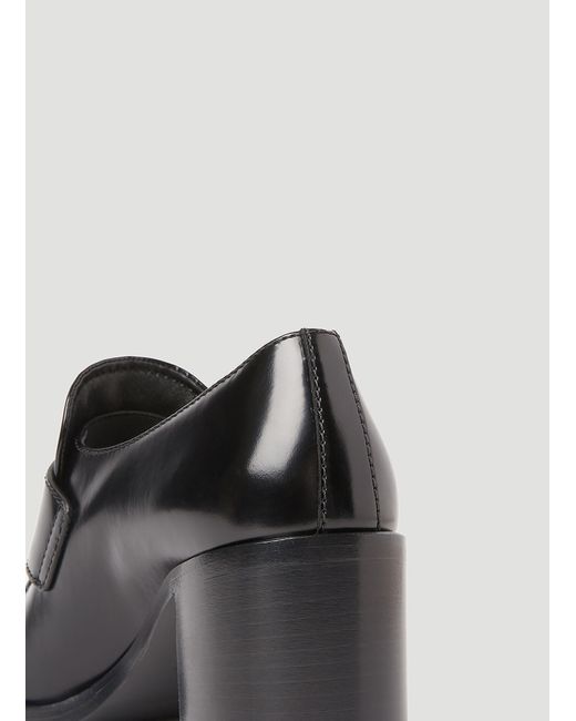 Prada Black Logo Plaque Heeled Loafers