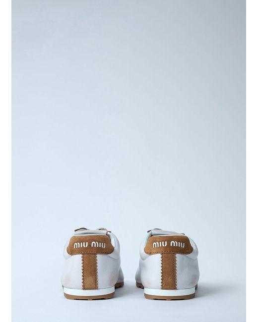 Miu Miu White Plume Sneakers