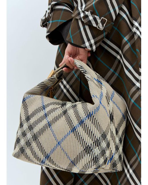 Burberry Medium Peg Duffle Handbag in Brown | Lyst